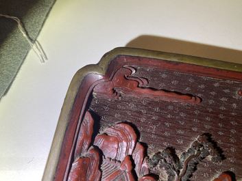 A pair of Chinese black and red cinnabar lacquer square dishes, Qianlong mark and of the period